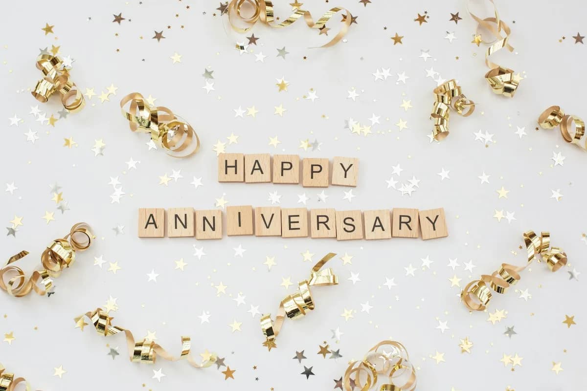 The words happy anniversary spelled out in letter tiles