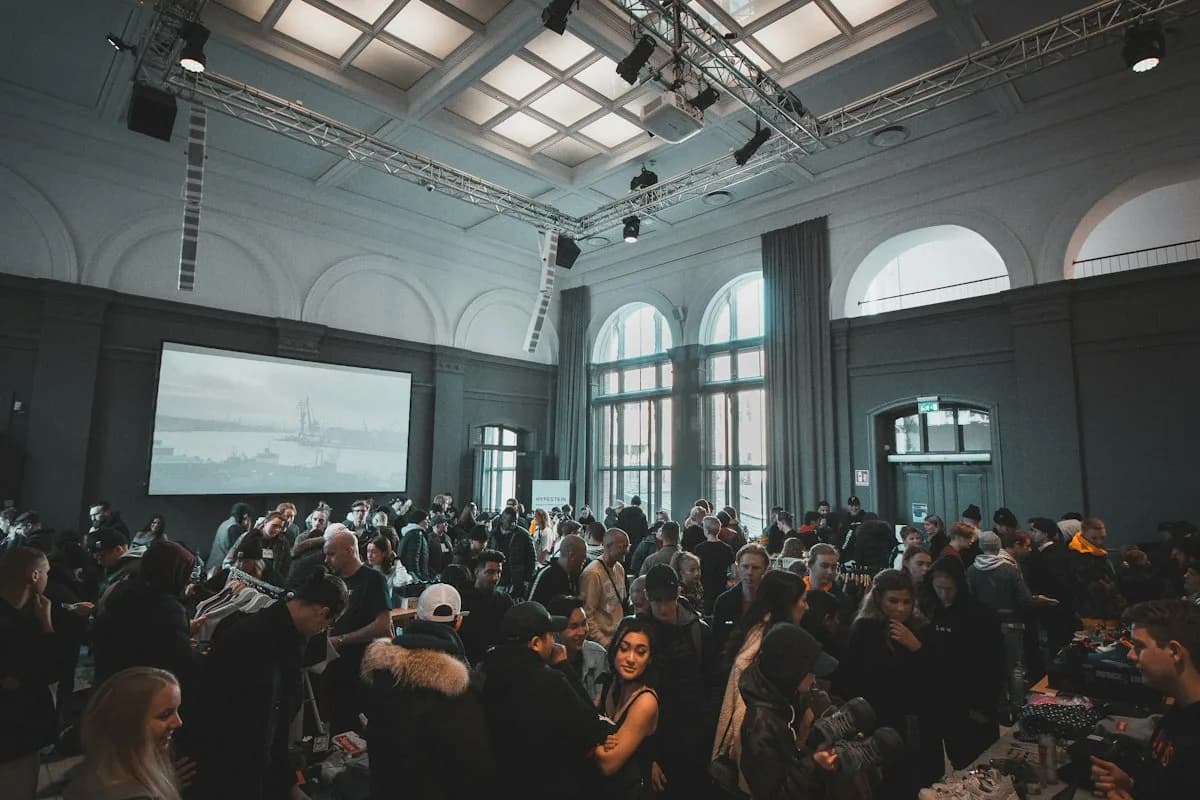 Attendees seated at a conference session